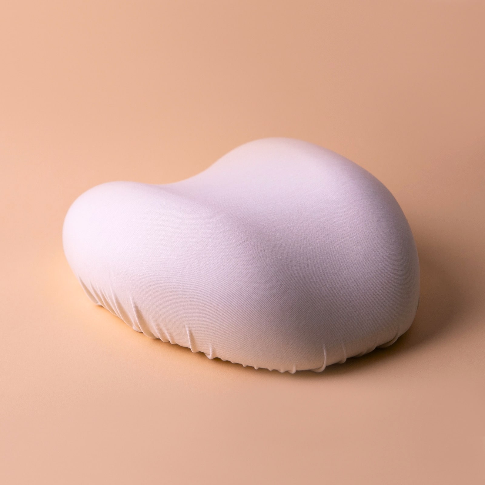 Soft pillow made out of flexible fabric and filled with foam