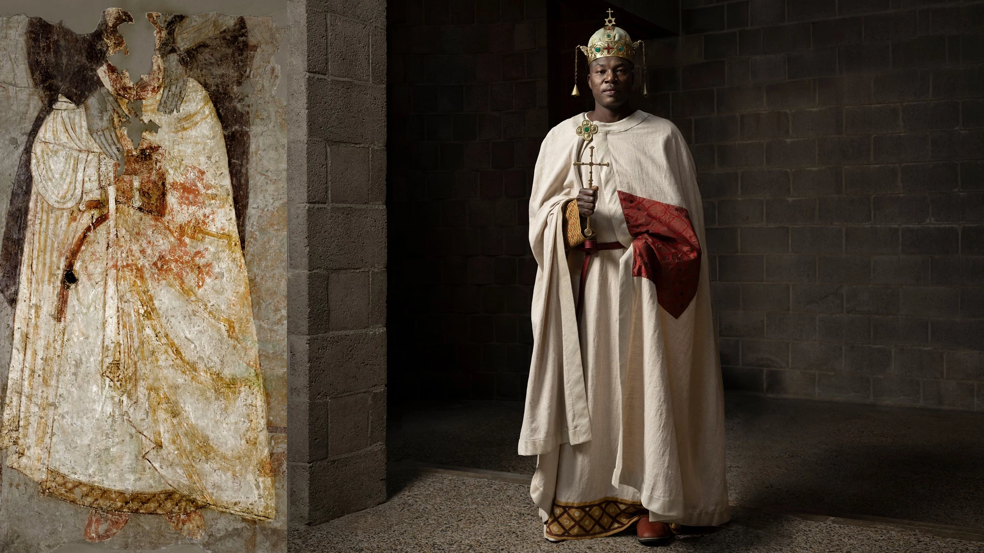 Picture featuring a model wearing a reconstructed outfit inspired by one of Faras’ designs, placed alongside the original Faras painting that inspired the final look.