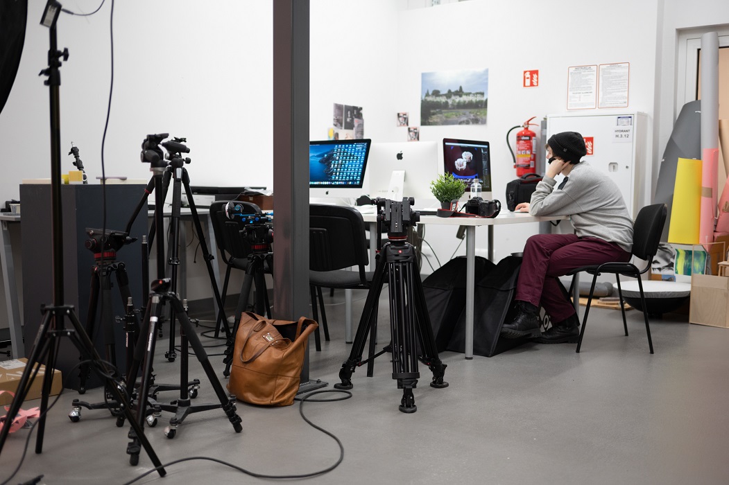 Interior of the studio. A view of tripods, computers and photographic equipment.
