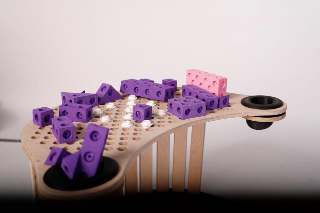 Rocker used as a construction table with building blocks on the tabletop