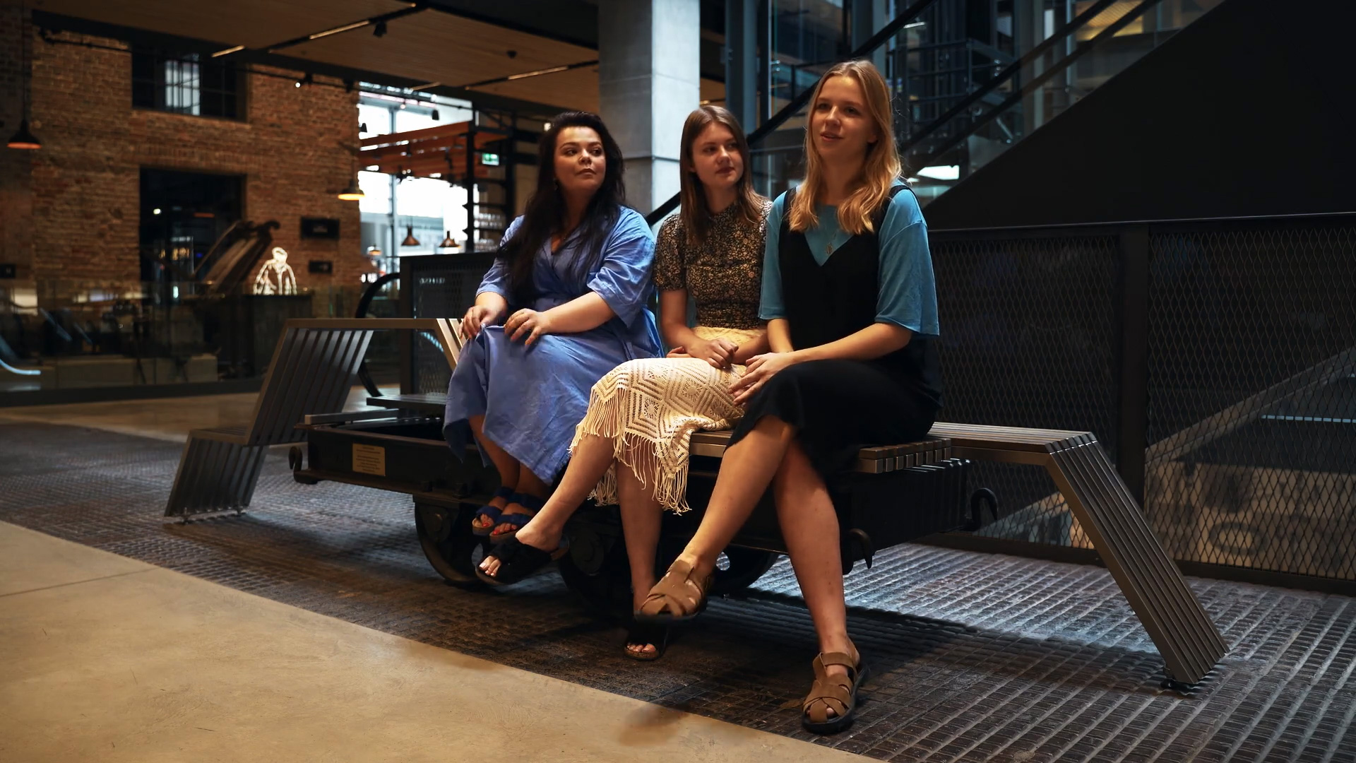 Dobrawa Orłowska, Anna Brzoza and Oliwia Warchałowska, students of the School of Form, on the bench they designed at the Norblin Factory | Screenshot from a video produced by Mediafresh for the Norblin Factory