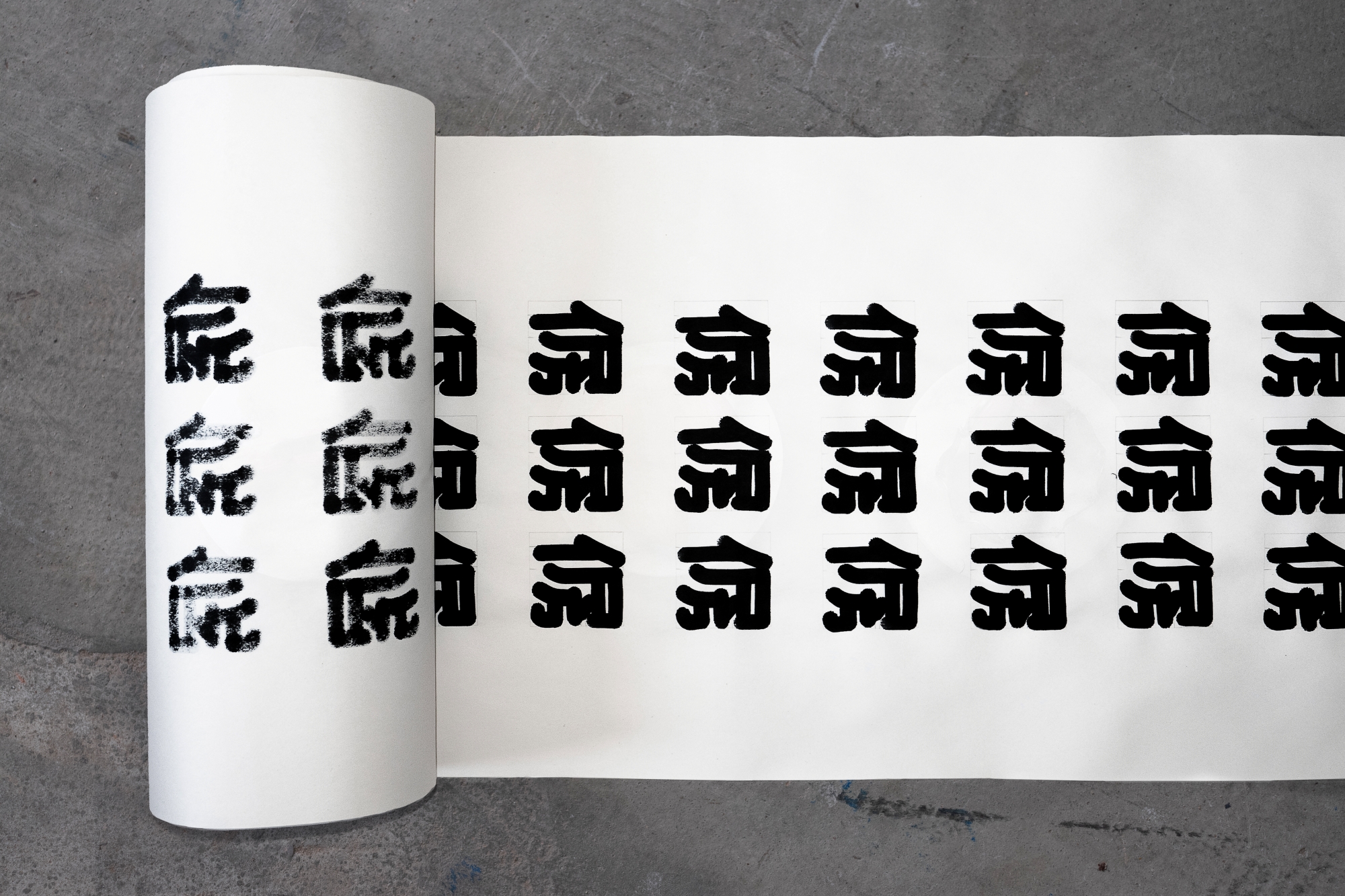 A roll of paper with hand-drawn symbols designed by Piotr Kuźmiuk