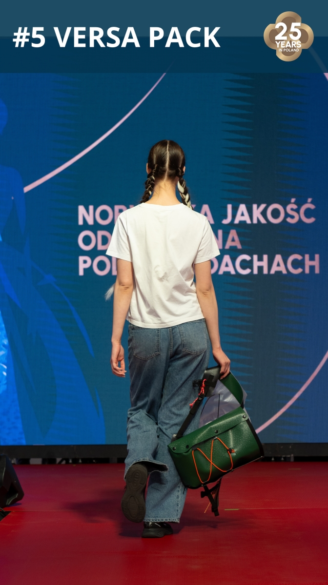 Fashion show: model wearing a backpack made of roofing membrane.